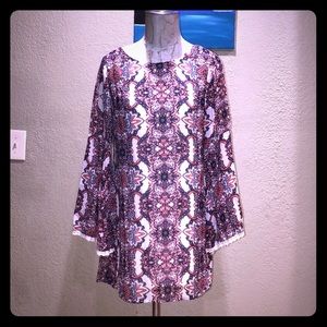 Open back above the knee dress